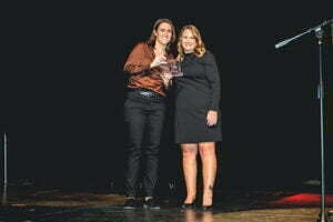 Michigan City Chamber of Commerce Board Chair Kim Giannetti (right) presented Michigan City native Megan Applegate, past board member and chair, with an Excellence in Leadership award for her eight years of service.